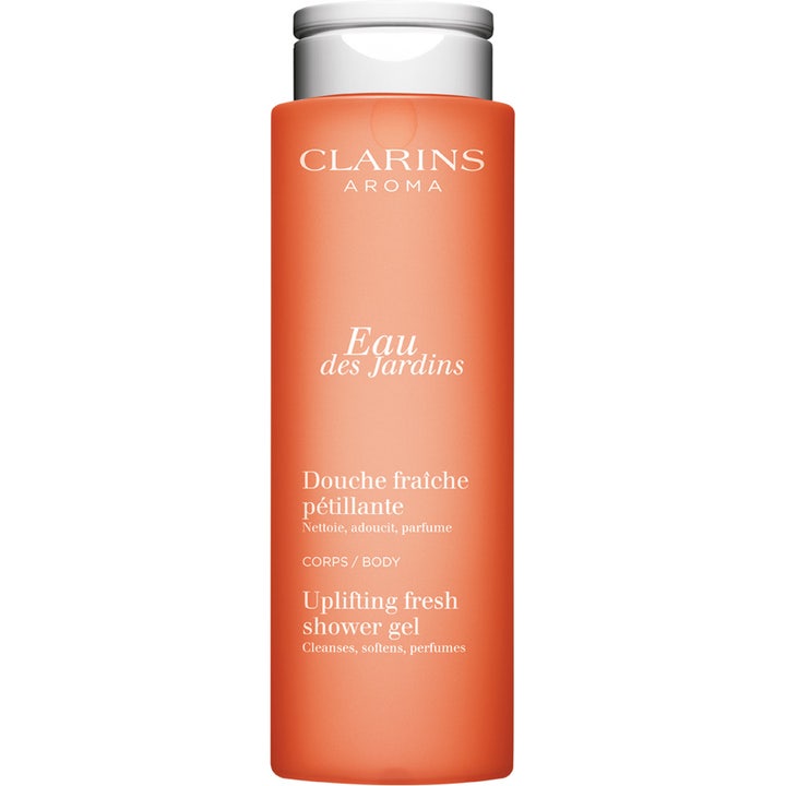 Clarins Aroma Eau des Jardins Uplifting Fresh Shower Gel oppløftende dusjgelé i oransje flaske med sølvkork