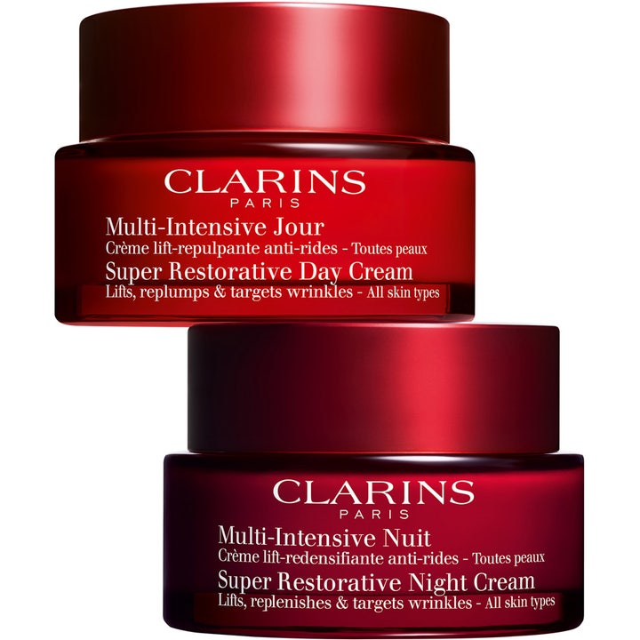 Clarins Super Restorative Night Cream 50 ml løftende nattkrem i to dype røde krukker for dag og nattpleie.