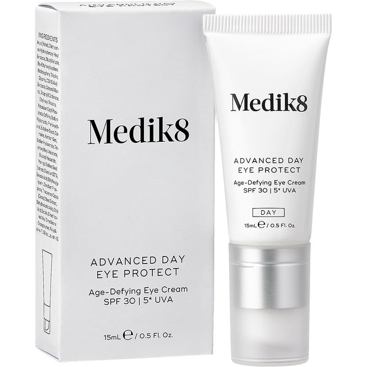 Medik8 Advanced Day Eye Protect 15 ml øyekrem med SPF 30 motvirker aldringstegn i hvit tube med sølvfarget kork.