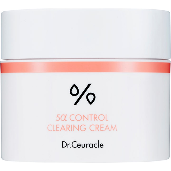 Dr. Ceuracle 5α Control Clearing Cream mattende ansiktskrem i en hvit krukke med ferskenfarget stripe.