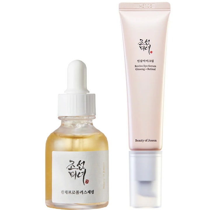 Beauty of Joseon Glow Serum og Revive Eye Serum sett gir glød med gul glassflaske og lyserød tube med hvit pumpe.