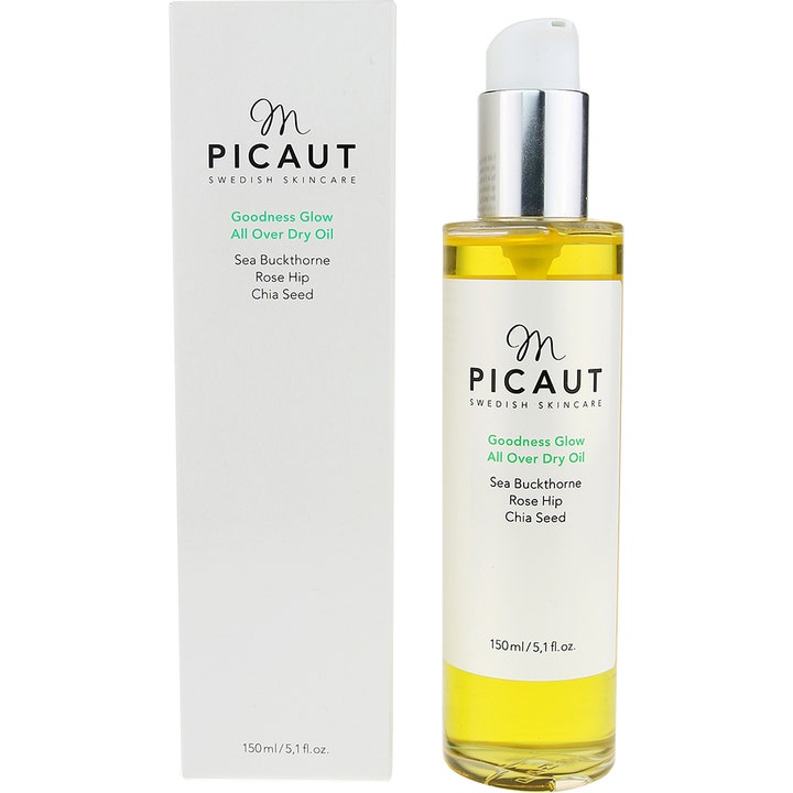 M Picaut Goodness Glow All Over Dry Oil 150 ml gir glød i klar pumpeflaske med hvit ytteremballasje og sølvdetaljer.