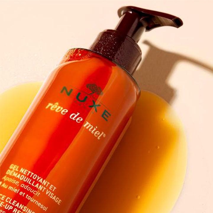 Nuxe Rêve de Miel Face Cleansing 200 ml beroligende rengjøringsgel i ravfarget flaske med gyllen honningtekstur