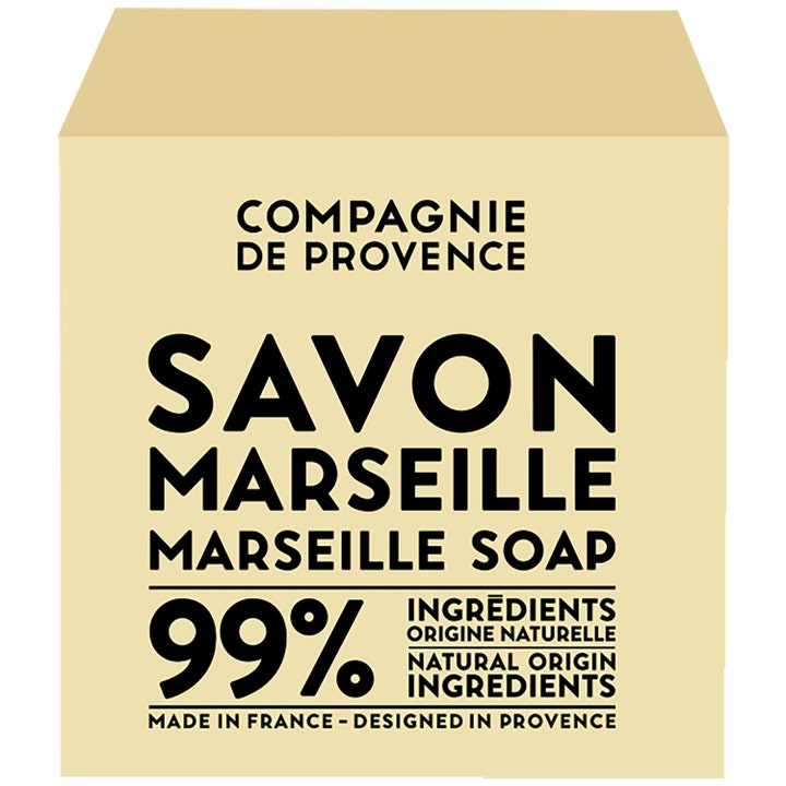 Compagnie de Provence Savon de Marseille fast såpe naturlig rens i en beige kubeformet blokk med sort tekst