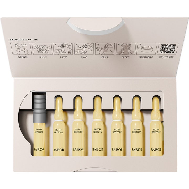 Babor Nutri Restore Ampoule 14 ml serum i åpen eske med syv glassampuller og bruksanvisning.