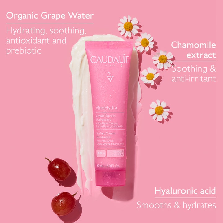 Caudalie Vinohydra Sorbet Cream 60 ml fuktighetskrem på rosa bakgrunn med hvite blomster og druer