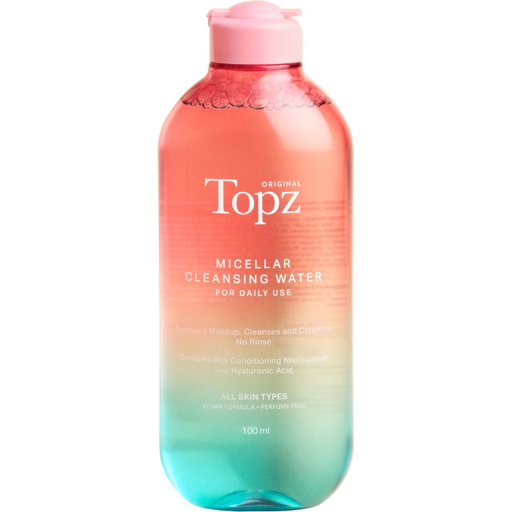 Topz Original Micellar Cleansing Water 100 ml fjerner sminke i en fargerik flaske med rosa kork og blå bunn