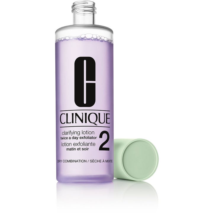 Clinique Clarifying Lotion 2 325 ml eksfolierende ansiktsvann for kombinasjonshud i lilla flaske med grønn kork.