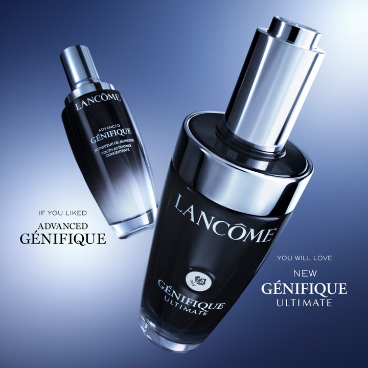 Lancôme Génifique Ultimate Serum 20 ml reparerende ansiktsserum i sorte glassflasker svevende mot blå bakgrunn