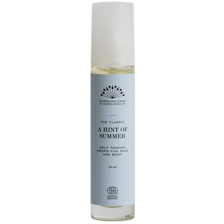 Rudolph Care A Hint of Summer 50 ml selvbruningsdråper gir naturlig glød i glassflaske med lyseblå etikett og hvit hette.