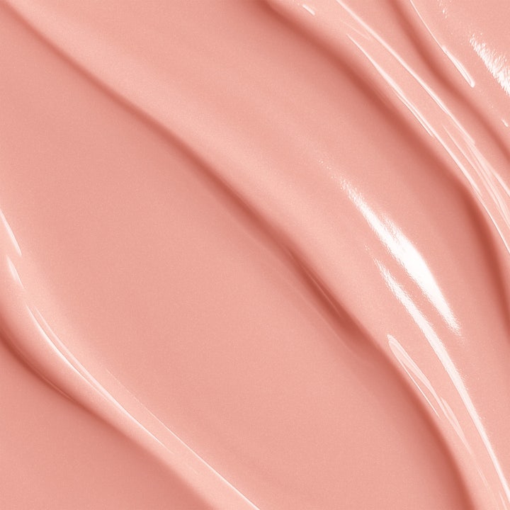 Biotherm Collagen Fit Body Cream 200 ml oppstrammende kroppskrem i hvit krukke som holdes i en hånd
