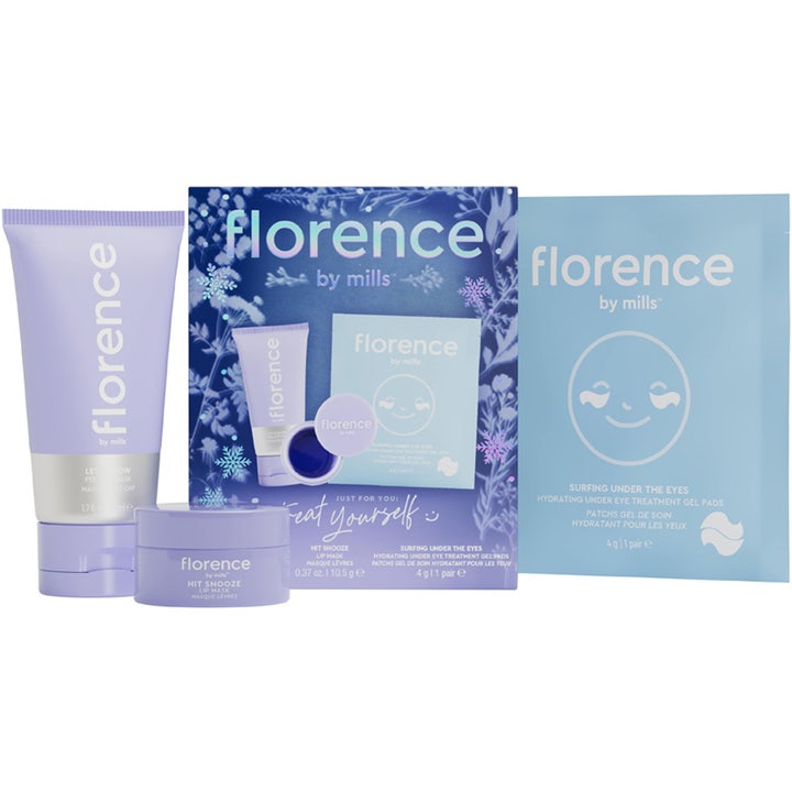 Florence by Mills Masking Party Gift Set hudpleiesett med lilla tube, krukke og blå øyepads i en blå gaveeske.
