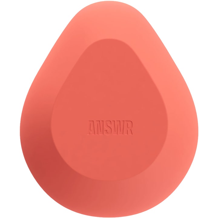 ANSWR Exfoliating Hair Removal Drop 1 stk hårborttagning eksfolierer huden med et korallfarget dråpeformet verktøy.