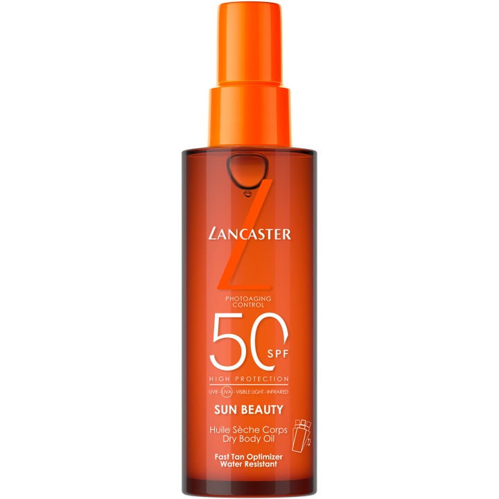 Lancaster Sun Beauty Dry Body Oil SPF 50 beskyttende tørrolje som gir glød i en oransje sprayflaske