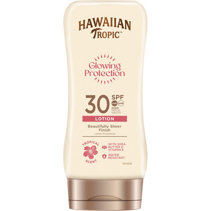 Hawaiian Tropic Glowing Protection SPF 30 lotion gir huden glød i en beige flaske med brunt metallisk lokk.