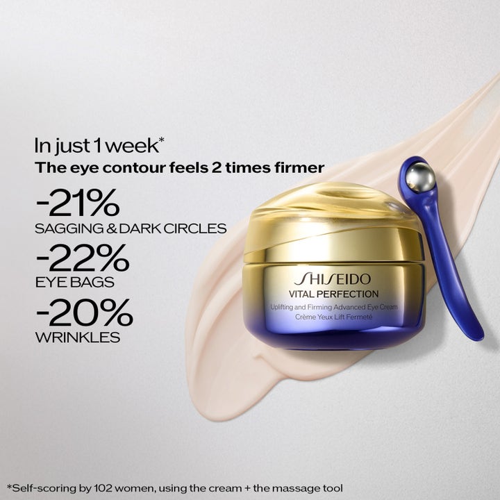 Shiseido Vital Perfection Advanced Eye Cream 15 ml oppstrammende øyekrem i gullkrukke med blått massasjeverktøy.