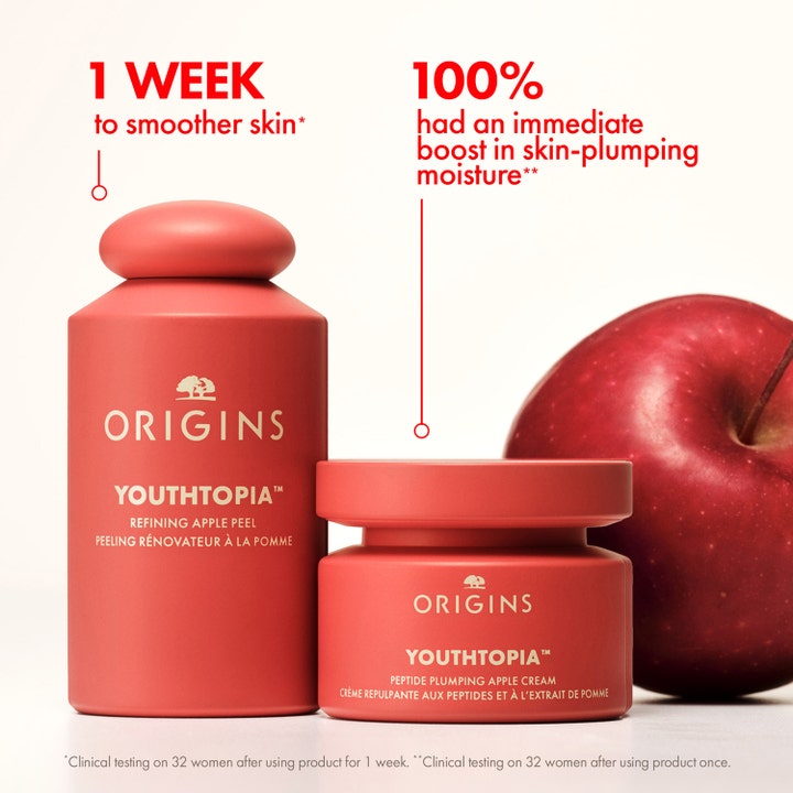 Origins Youthtopia Peptide Plumping Apple Cream 50 ml fuktighetskrem i rød krukke ved siden av et eple