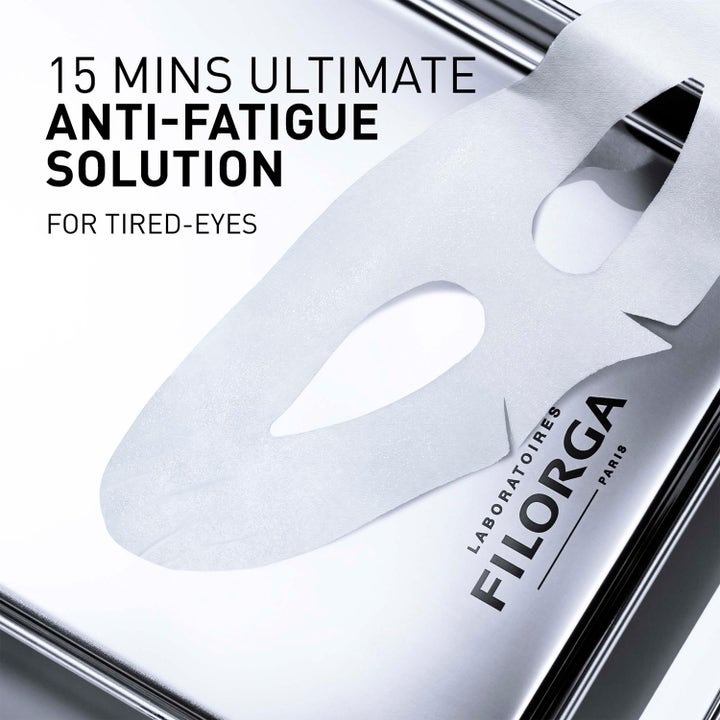 Filorga Optim-Eyes Eye Mask 6 ml øyemaske mot tretthetstegn viser hvit patch og tekst om 15 mins anti-fatigue solution
