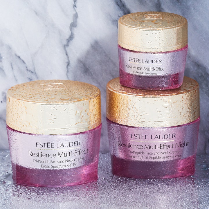 Estée Lauder Resilience Multi-Effect 50 ml SPF 15 dagkrem i rosa glasskrukke med gulllokk dekket av vanndråper