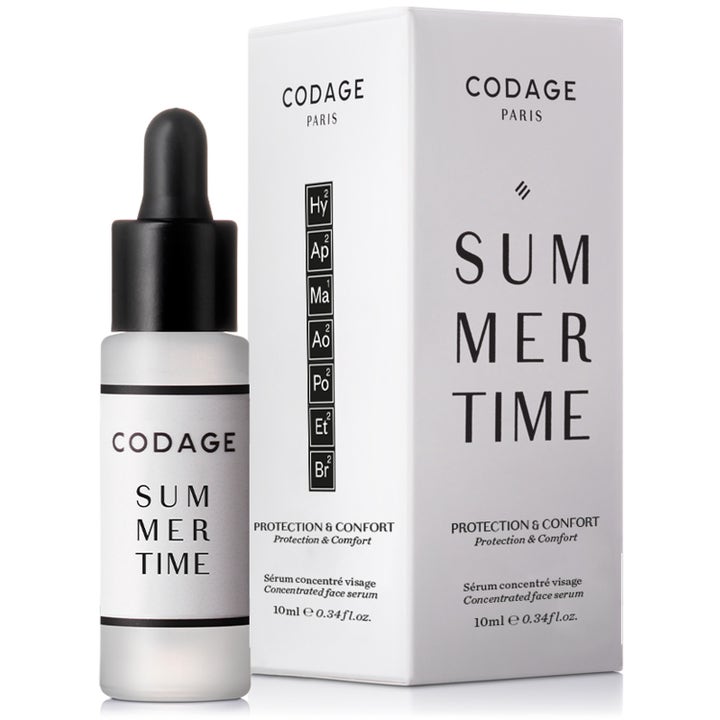 Codage Paris The Summer Time Serum 10 ml beskyttende ansiktsserum i frostet glassflaske med sort pipette og eske.