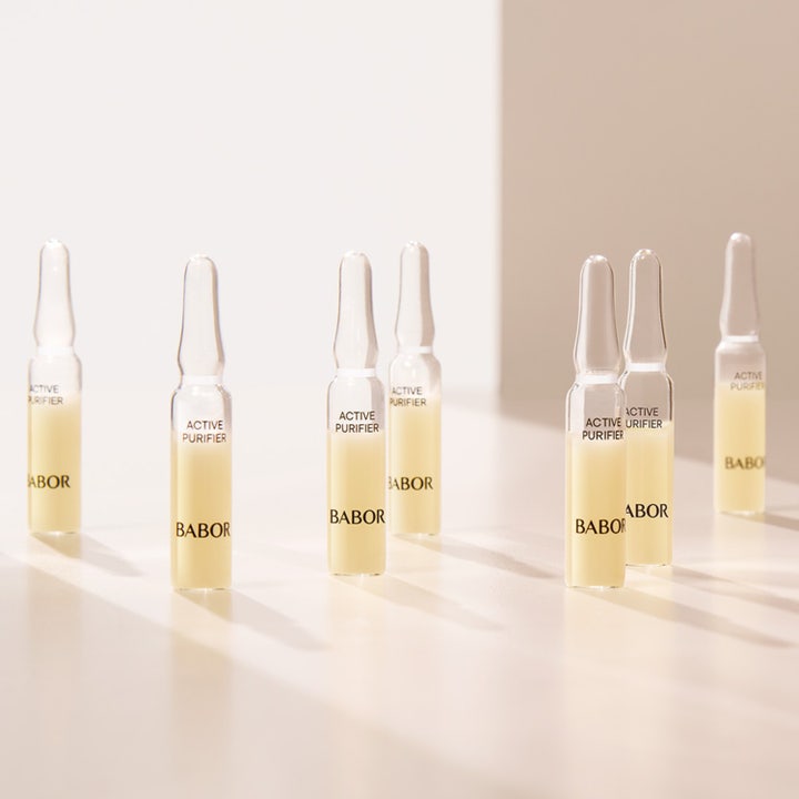 Babor Ampoule Active Purifier 14 ml ansiktsserum mot urenheter viser syv glassampuller med lysegult serum på lys flate