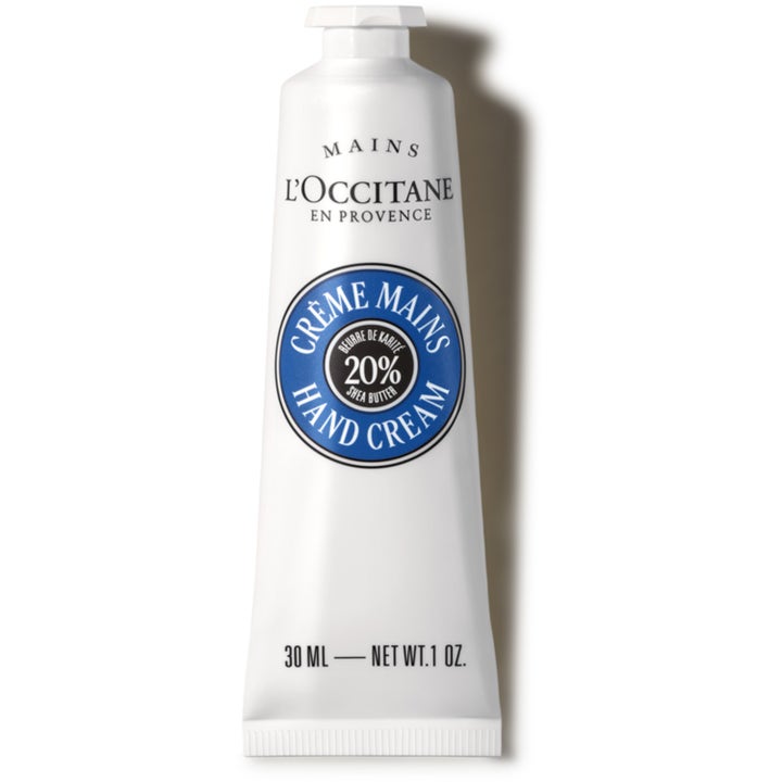 L'Occitane Shea Butter Hand Cream 30 ml pleiende håndkrem som gir fukt i hvit tube med blå logo og hvit kork