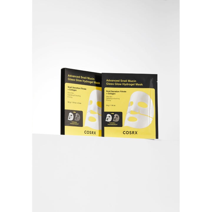 COSRX Advanced Snail Mucin Glass Glow Hydrogel Mask 3 stk fuktighetsgivende ansiktsmaske i gul og svart eske med snegleslim