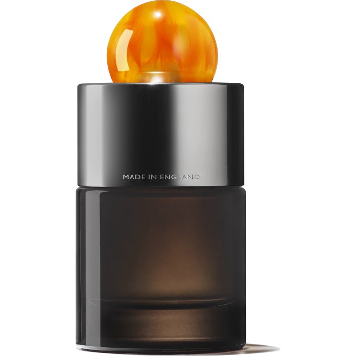 Molton Brown Sunlit Clementine & Vetiver Eau de Parfum 100 ml i mørk glassflaske med oransje kork ved siden av esken