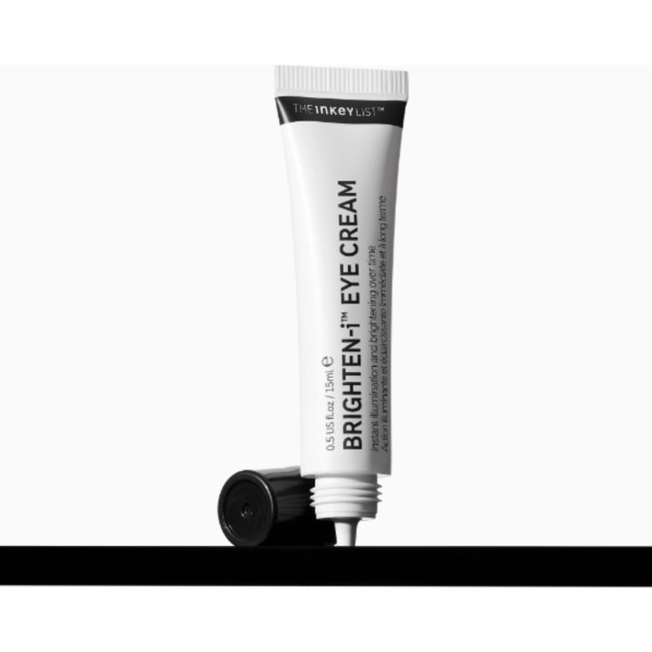 The INKEY List Brighten-i Eye Cream 15 ml opplysende øyekrem i hvit tube som gir glød og reduserer mørke ringer.