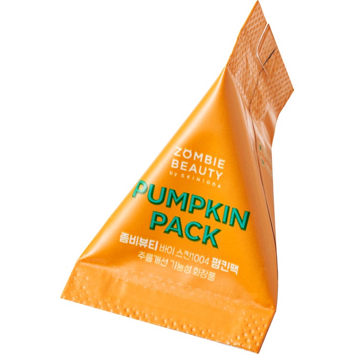 SKIN1004 Zombie Beauty Pumpkin Pack 16 stk beroligende ansiktsmaske i oransje trekantet porsjonspakning med grønn tekst