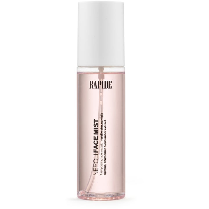Rapide Neroli Face Mist fuktgivende ansiktsspray med lys rosa væske i klar flaske med hvit kork