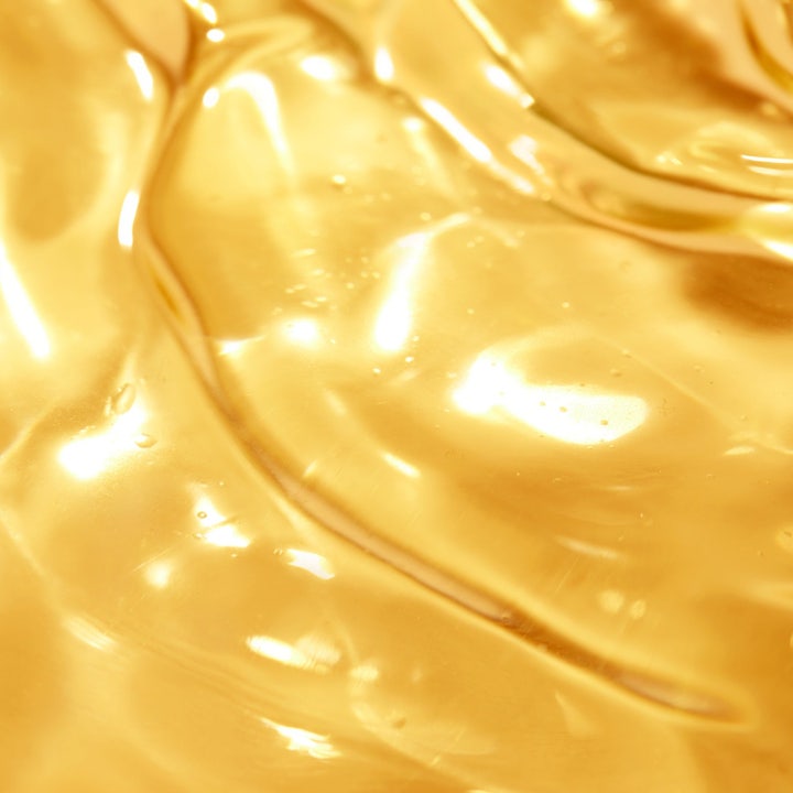 Nuxe Tanning Sun Oil 150 ml SPF50 solkrem til kropp med gyllen oljetekstur i vann for høy solbeskyttelse