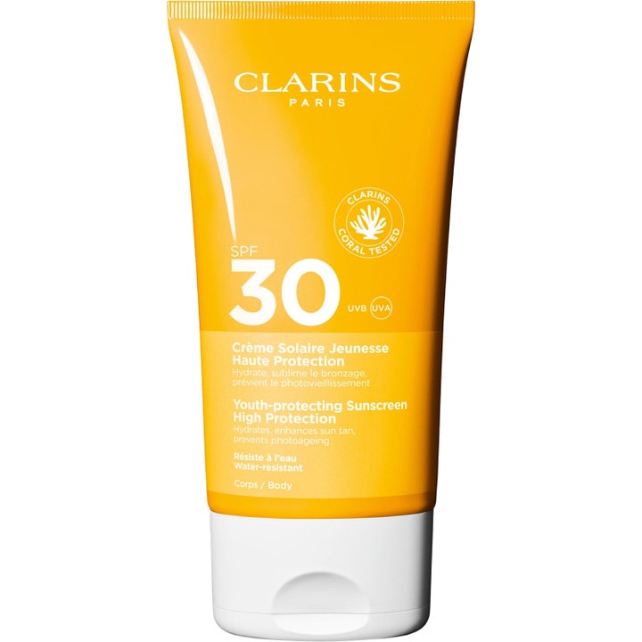 Clarins Youth-Protecting Sunscreen SPF 30 solkrem i en gul plasttube som beskytter og fukter huden.