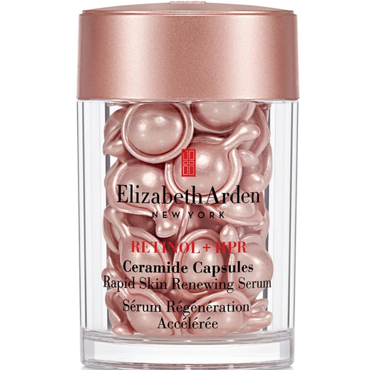 Elizabeth Arden Retinol + HPR Ceramide Capsules fornyende serum i krukke fylt med glinsende rosegullfargede kapsler