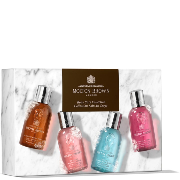 Molton Brown Body Quad 400 ml kroppspleiesett i hvit marmoreske med fire fargerike dusjgeleer og sølvkorker
