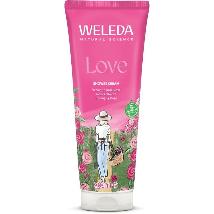 Weleda Love Shower Cream 200 ml pleiende dusjkrem i rosa tube med illustrasjon av en kvinne i en rosehage.