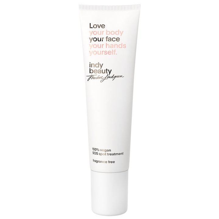 Indy Beauty SOS Spot Treatment mot kviser i en hvit vegansk tube med rosa og sort tekst for uren hud