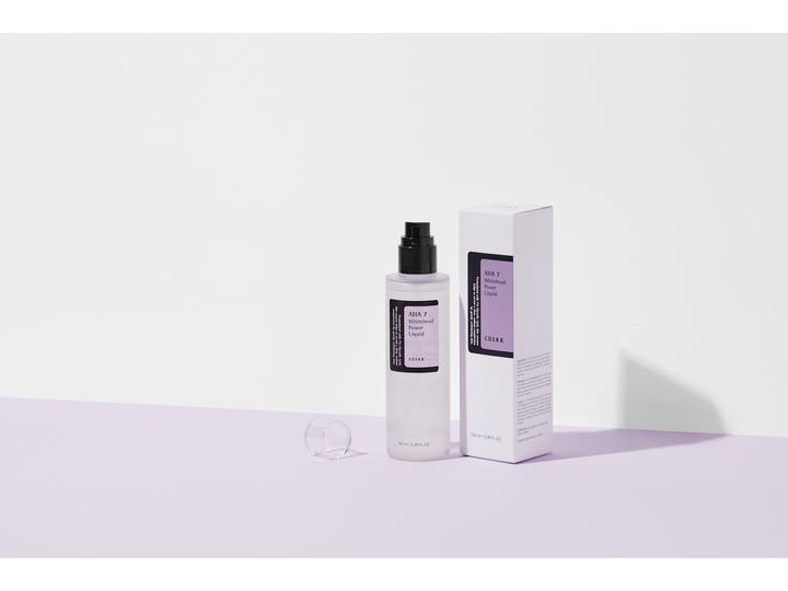 COSRX AHA 7 Whitehead Power Liquid 100 ml eksfolierende toner mot whiteheads i frostet flaske med pumpe og hvit eske