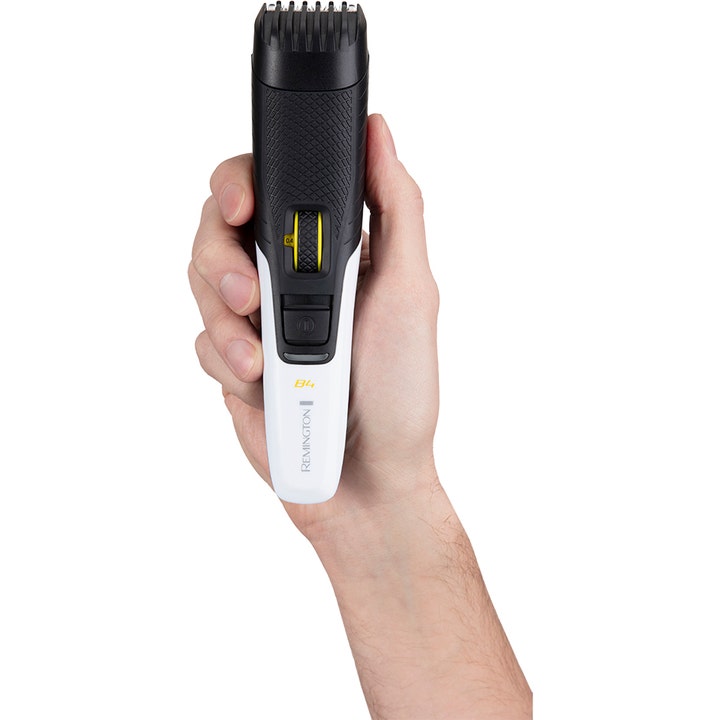 Remington MB4000 Style Series Beard Trimmer B4 1 stk skjeggtrimmer i en hånd med hvit og svart overflate