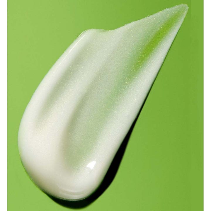 Murad Resurgence Retinol Youth Renewal Serum 30 ml fornyende serum med kremet hvit og skimrende tekstur på grønn bakgrunn