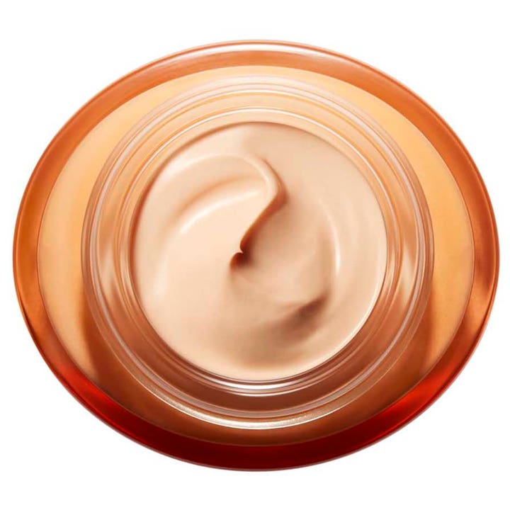Clarins Extra-Firming Energy Day Cream 50 ml glødgivende dagkrem med ferskenfarget tekstur i oransje krukke