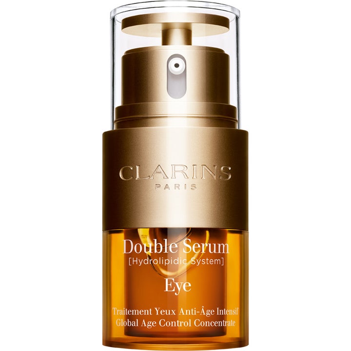 Clarins Double Serum Eye oppstrammende øyeserum i en gyllen pumpeflaske med transparent bunn og tofaset innhold.