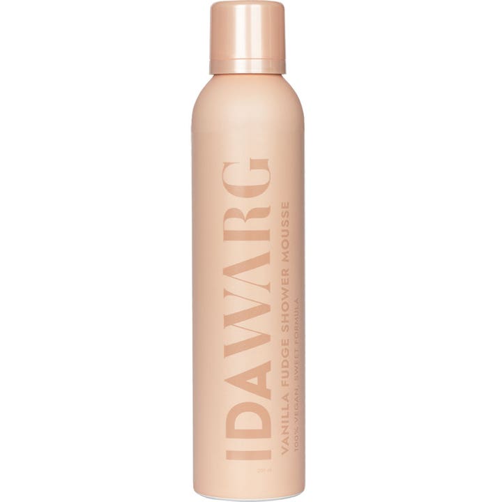 Ida Warg Vanilla Fudge Shower Mousse 200 ml fuktighetsgivende dusjskum i ferskenfarget flaske med stor vertikal logo