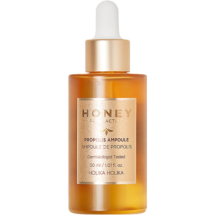 Holika Holika Honey Royalactin Propolis Ampoule 30 ml gir glød i frostet gyllen glassflaske med gulldetaljer