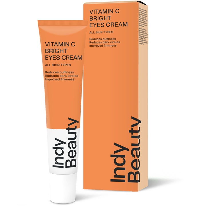 Indy Beauty Vitamin C Bright Eyes Cream 15 ml øyekrem mot mørke ringer i oransje tube og matchende eske.