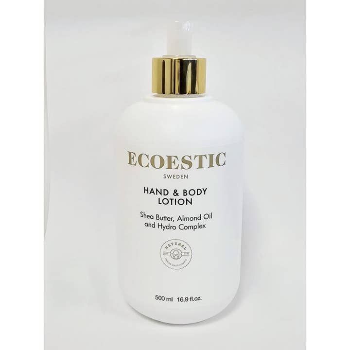 Ecoestic Hand & Body Lotion 500 ml nærende fuktighetskrem med sheasmør i hvit pumpeflaske med detaljer i gull