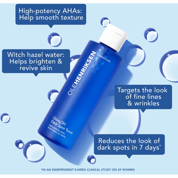 Ole Henriksen Glow2OH Dark Spot Toner 190 ml ansiktsvann med AHA som reduserer mørke flekker i blå flaske med vanndråper