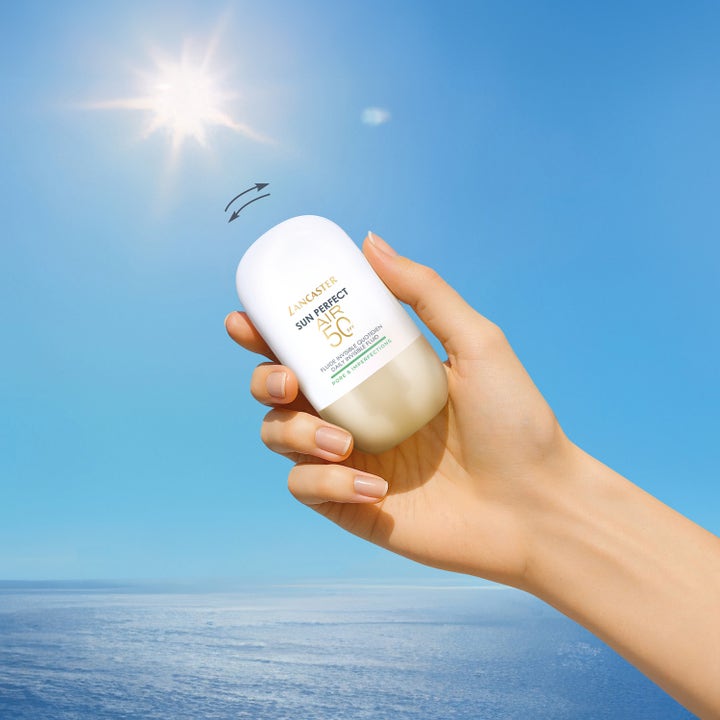 Lancaster Sun Perfect AIR Daily Invisible Fluid 40 ml solkrem for ansiktet mot urenheter holdes mot sol og hav