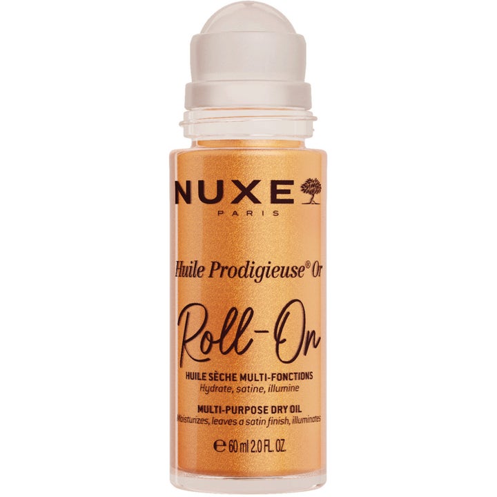 Nuxe Huile Prodigieuse Or Roll-On 60 ml glitrende tørrolje i transparent flaske med hvit roll-on-applikator som gir glød