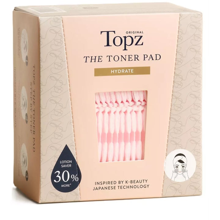 Topz The Toner Pad fuktighetsgivende tonerpads i beige og rosa eske med vindu som viser teksturerte rosa pads